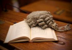 wig and book in court second
